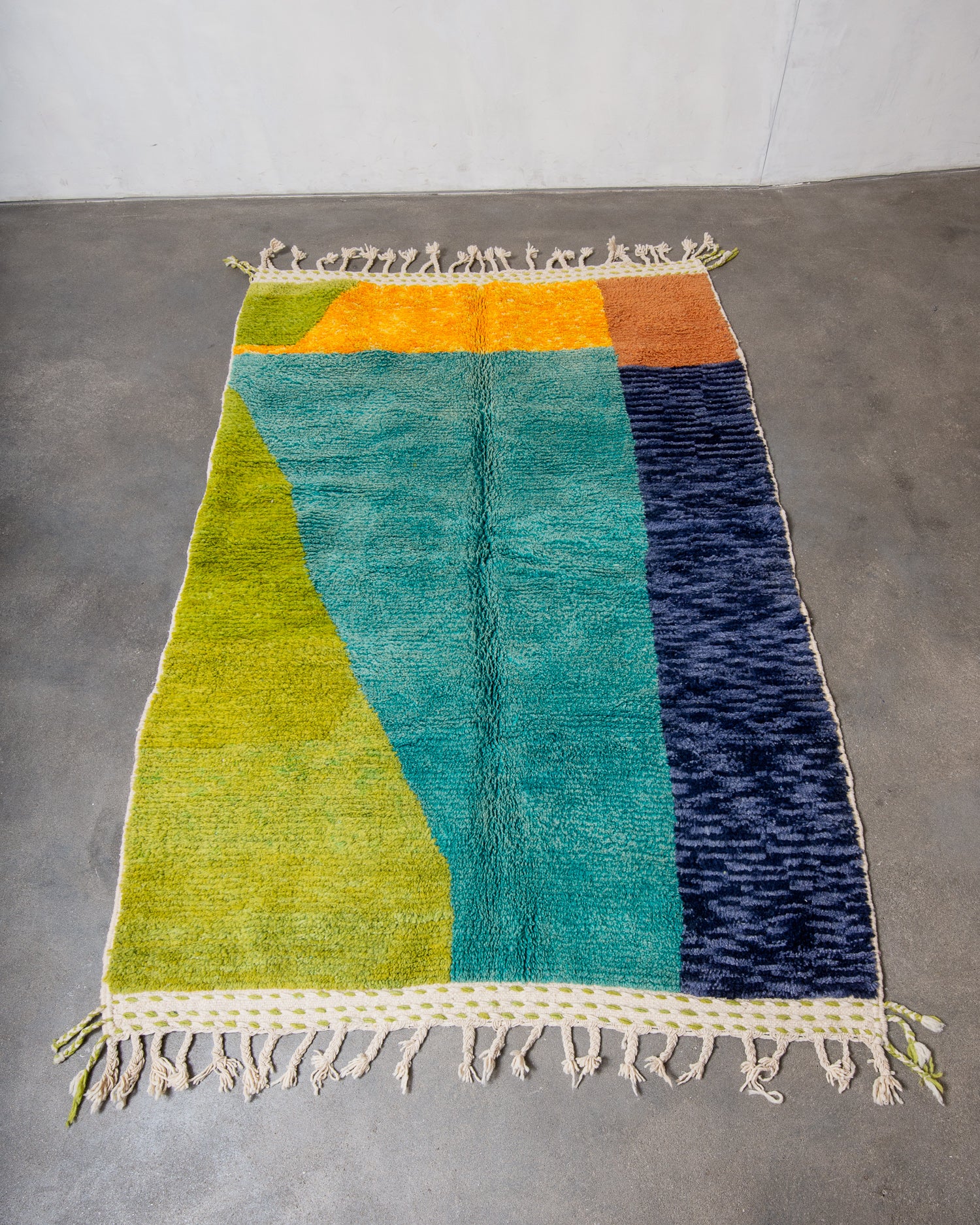 Modern, designer, handcrafted Berber rug from Morocco. Beniourain carpet with beautiful colours and patterns and fluffy wool texture.